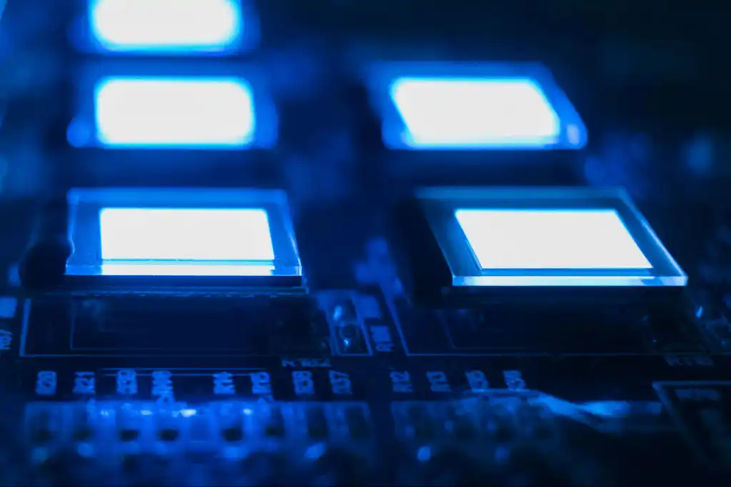Electronic components with blue light panels illustrating What Is an OLED Display technology in detail
